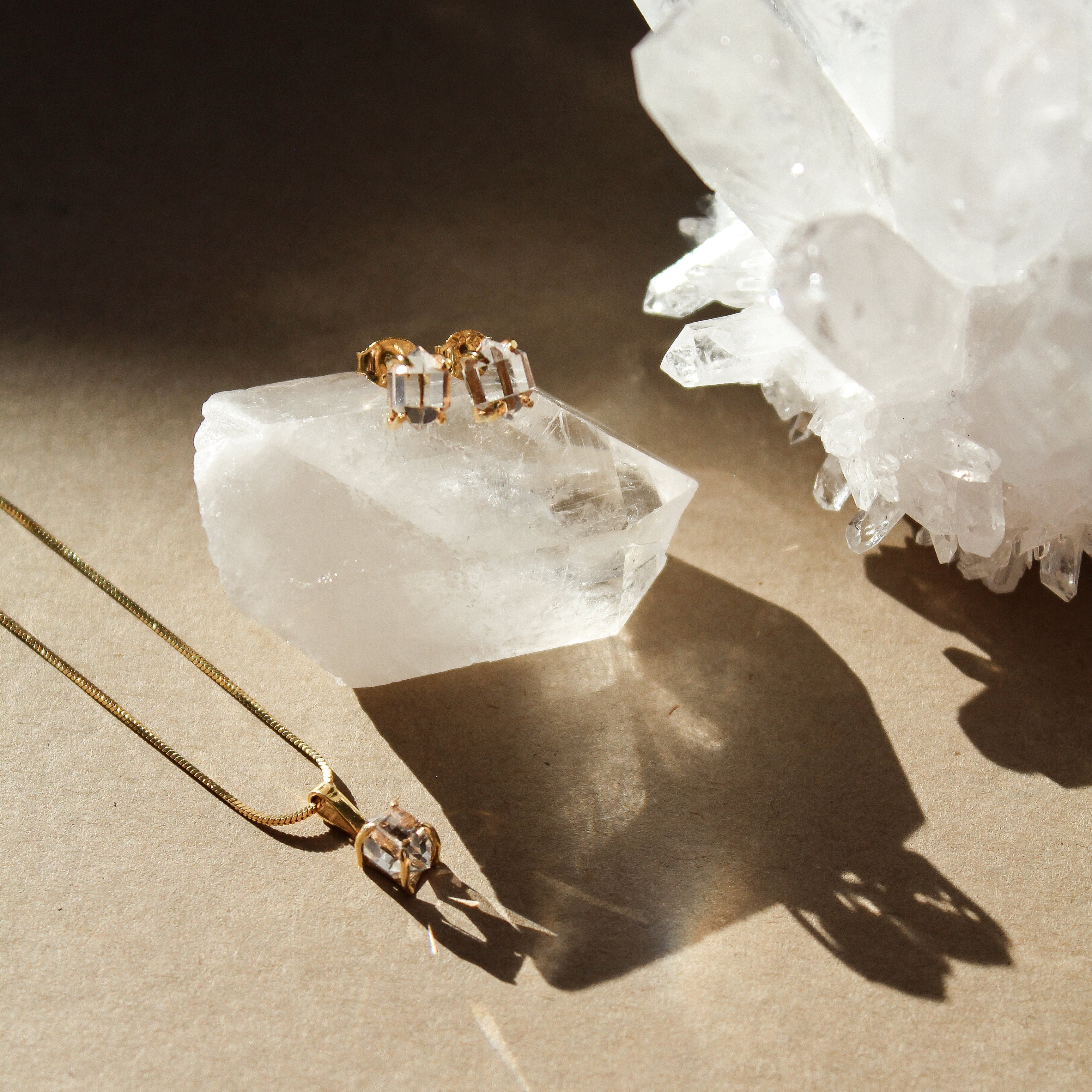 BABY CHARM - CRYSTAL QUARTZ (GOLD-PLATED)